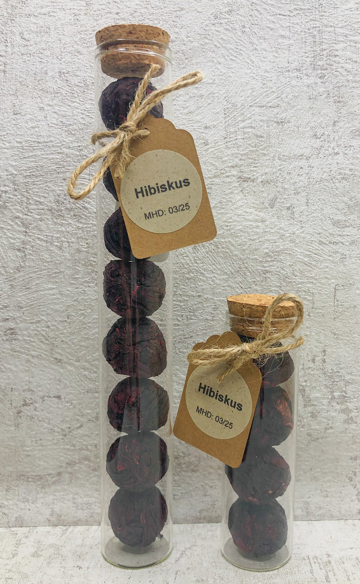 Hibiscus - flowering tea in glass with cork lid