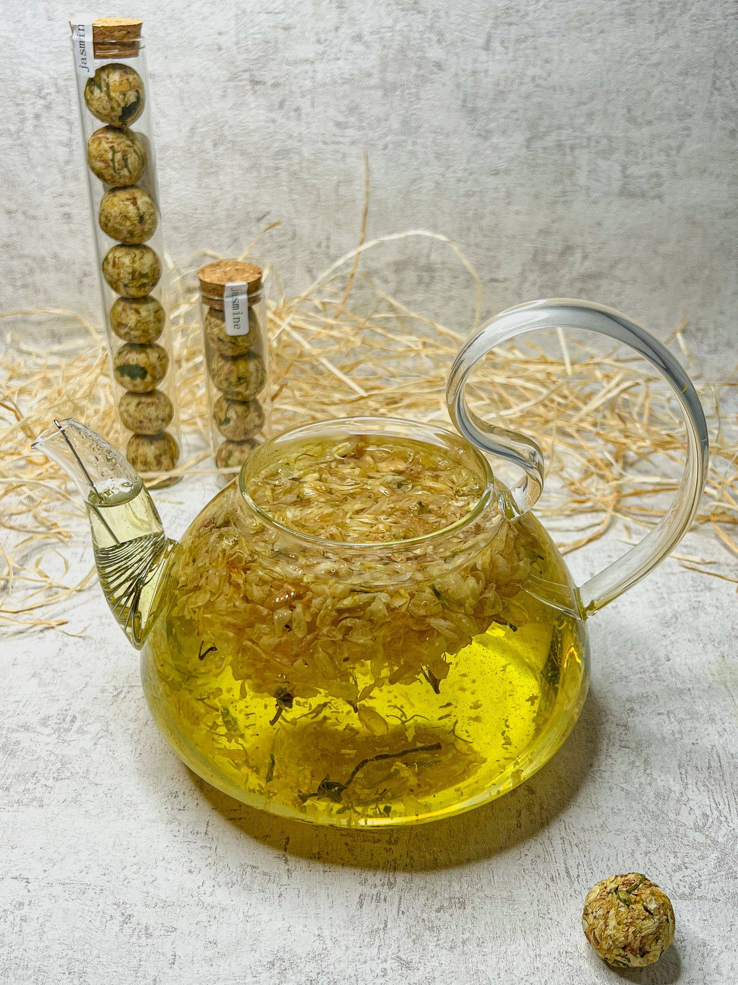 Jasmine - flowering tea in glass with cork lid