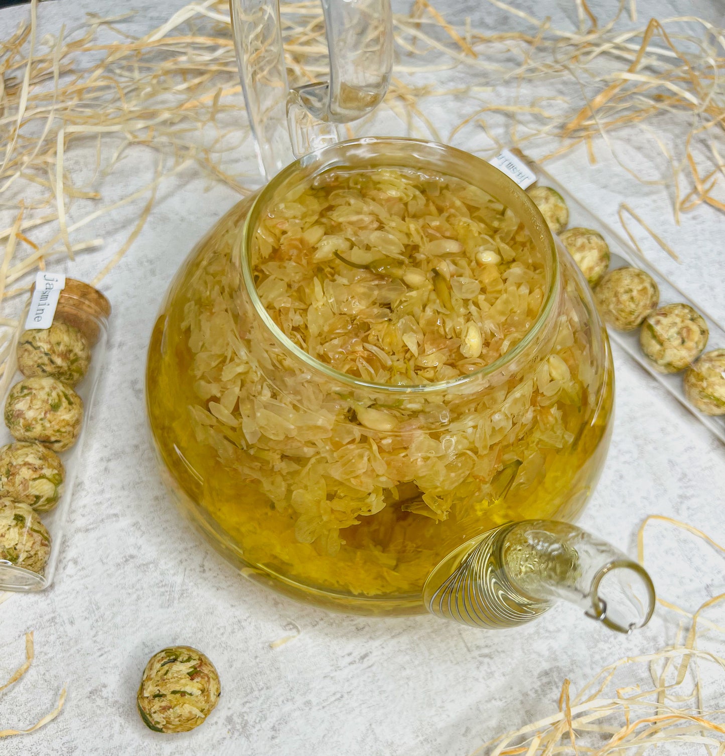 Jasmine - flowering tea in glass with cork lid