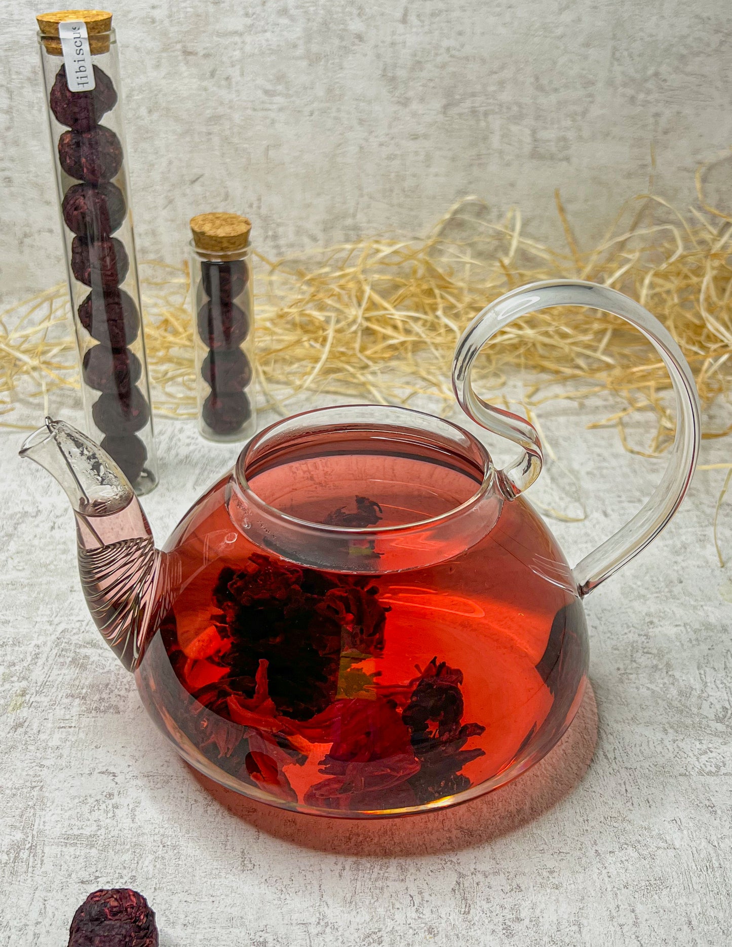 Hibiscus - flowering tea in glass with cork lid