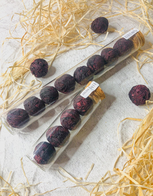 Hibiscus - flowering tea in glass with cork lid